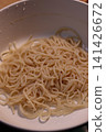 Steaming Plate of Cooked Pasta Noodles 141426672