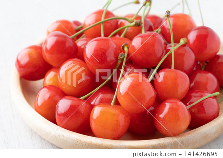 Close-up of cherries (Sato Nishiki variety) on a plate Close-up of cherries (Sato Nishiki variety) on a plate 141426695