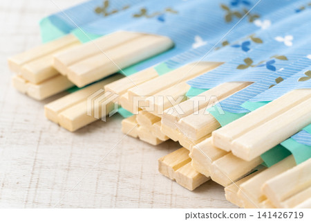 Close-up of the tips of many disposable chopsticks Close-up of the tips of many disposable chopsticks 141426719