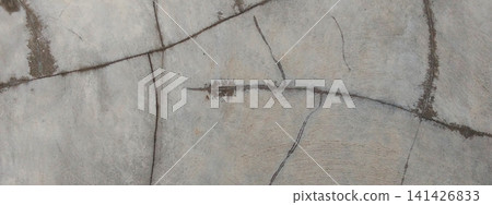 Fine, spider web-like cracks on the polished concrete surface. Fine, spider web-like cracks on the polished concrete surface. 141426833