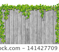 Ivy and gray wood wall (vertical) 141427709