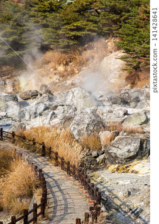 A walking trail through Unzen Jigokudani (Hell Valley), where the smell of sulfur hangs in the air; the scenery of Oito Jigoku (Oito Hell). A walking trail through Unzen Jigokudani (Hell Valley), where the smell of sulfur hangs in the air; the scenery of Oito Jigoku (Oito Hell). 141428641