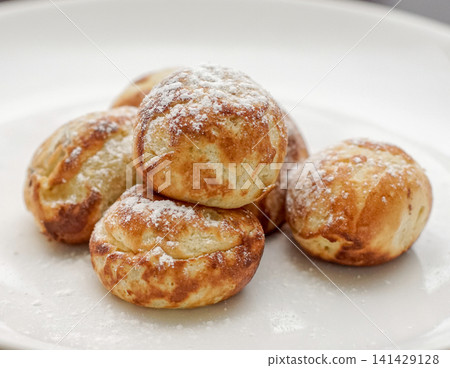 Danish Aebleskiver Pancake Balls Dessert Close Up with Sugar Danish Aebleskiver Pancake Balls Dessert Close Up with Sugar 141429128