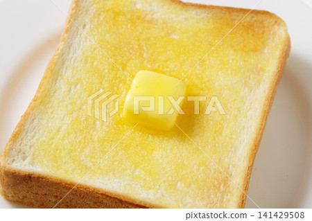 Freshly baked buttered toast Freshly baked buttered toast 141429508