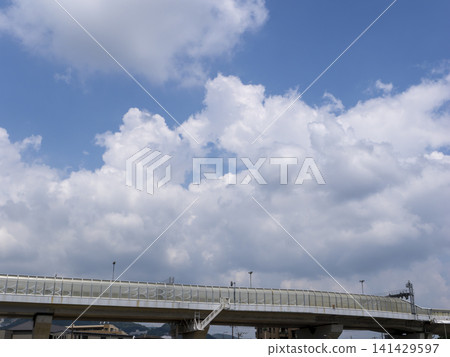 Elevated urban expressway and cumulonimbus clouds Elevated urban expressway and cumulonimbus clouds 141429597