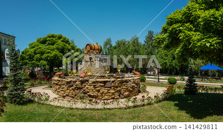 Beautiful stone wine fountain at Milestii Mici winery entrance Beautiful stone wine fountain at Milestii Mici winery entrance 141429811