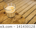 Coffee With Milk on Wooden Table With Copy Space 141430128