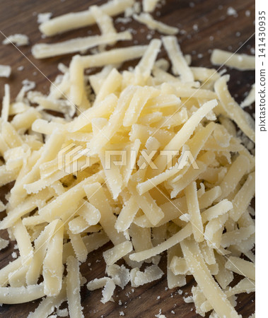 Pile grated parmesan cheese ready cooking Pile grated parmesan cheese ready cooking 141430935