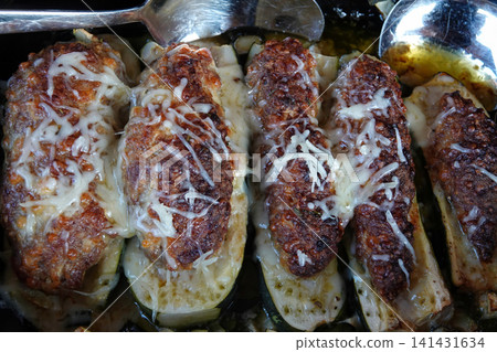 Delicious Stuffed Zucchini Boats with Melted Cheese and Flavorful Filling Ready to Serve Delicious Stuffed Zucchini Boats with Melted Cheese and Flavorful Filling Ready to Serve 141431634