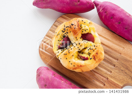 Sweet potato bread on a cutting board Sweet potato bread on a cutting board 141431986