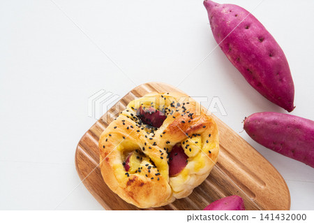 Sweet potato bread on a cutting board Sweet potato bread on a cutting board 141432000