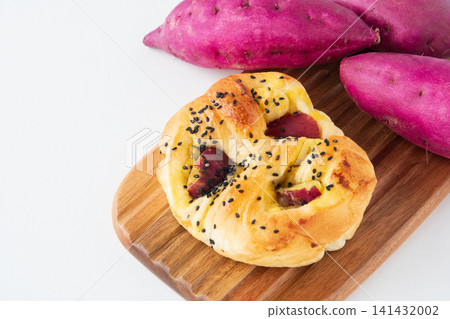 Sweet potato bread on a cutting board Sweet potato bread on a cutting board 141432002