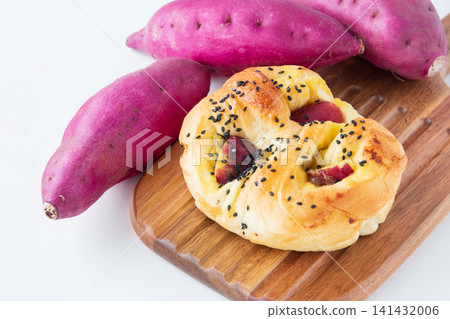 Sweet potato bread on a cutting board Sweet potato bread on a cutting board 141432006
