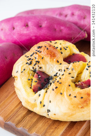 Sweet potato bread on a cutting board Sweet potato bread on a cutting board 141432110
