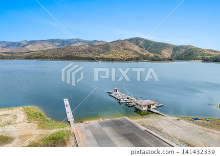 Aerial view Otay Lakes County Park in Chula Vista, California, a scenic view of a mountain range 141432339