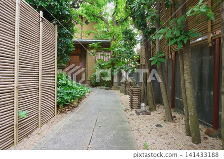 Stone-paved alley with a bamboo fence 3 Stone-paved alley with a bamboo fence 3 141433188