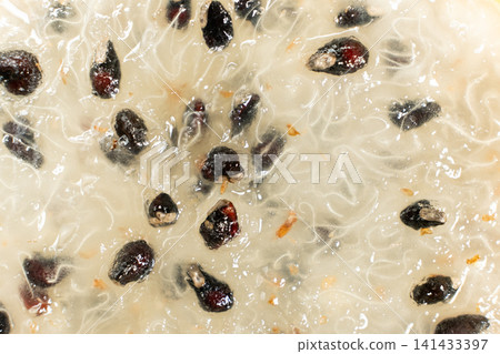 Extreme macro texture of dragon fruit flesh and seeds 141433397