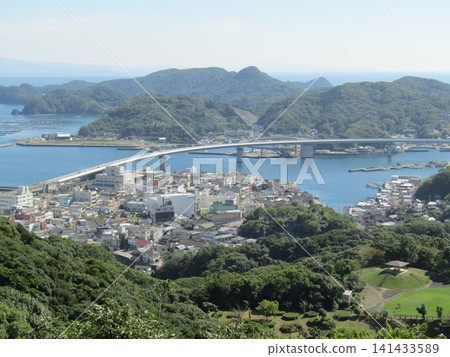 The 883-meter-long Ushibuka Haiya Bridge as seen from Tomiyama Suisen Park in Ushibuka-cho, Amakusa City, Kumamoto Prefecture. The 883-meter-long Ushibuka Haiya Bridge as seen from Tomiyama Suisen Park in Ushibuka-cho, Amakusa City, Kumamoto Prefecture. 141433589