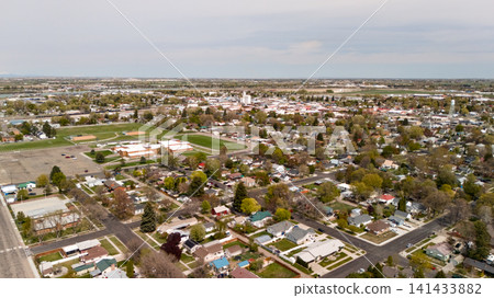 Aerial View Of Small Town Center With School And Tree Lined Streets Aerial View Of Small Town Center With School And Tree Lined Streets 141433882