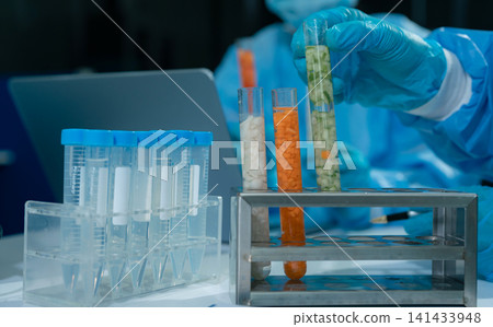 Microbiologists and nutrition experts analyze molecular samples in advanced food science labs, exploring innovations in nutrition, psychiatry, and health science research. Microbiologists and nutrition experts analyze molecular samples in advanced food science labs, exploring innovations in nutrition, psychiatry, and health science research. 141433948