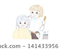 A senior woman is sitting in a chair at a hair salon, wearing a cape, and talking to the hairdresser. 141433956
