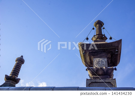 A Hōkyōintō pagoda stands against the winter sky at Dairyūji Temple in Tabata. A Hōkyōintō pagoda stands against the winter sky at Dairyūji Temple in Tabata. 141434230