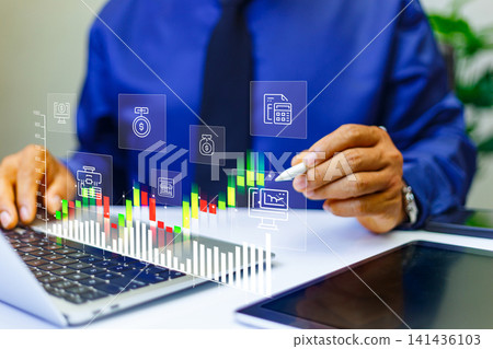 investment and finance concept, businessman holding virtual trading graph and blurred coins on hand, growing graph, business investment profit and dividend saving growth investment and finance concept, businessman holding virtual trading graph and blurred coins on hand, growing graph, business investment profit and dividend saving growth 141436103