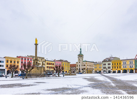 Kroměříš, Czech Republic: The Column of the Virgin Mary and the Tower of the Old Town Hall in the Great Square. Kroměříš, Czech Republic: The Column of the Virgin Mary and the Tower of the Old Town Hall in the Great Square. 141436596