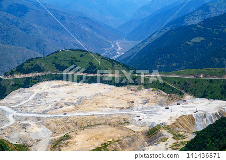 Mountainous landscape with active quarry operation Mountainous landscape with active quarry operation 141436871