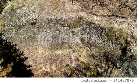 Aerial view of Yagi Castle, a mountain castle in Tajima Province, showing the baileys and stone walls. 141437076