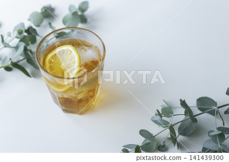Lemon iced tea and eucalyptus: a refreshing summer image with plenty of open space. Lemon iced tea and eucalyptus: a refreshing summer image with plenty of open space. 141439300