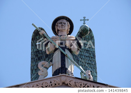 Saint Michael on the top of the San Michele in Foro Church in Lucca, Italy Saint Michael on the top of the San Michele in Foro Church in Lucca, Italy 141439845
