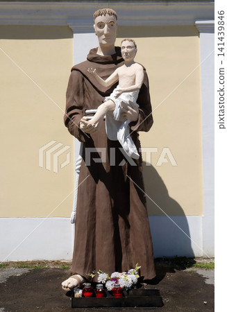 Saint Anthony of Padua statue in front of Parish Church of Saint Nicholas in Hrvatska Kostajnica, Croatia Saint Anthony of Padua statue in front of Parish Church of Saint Nicholas in Hrvatska Kostajnica, Croatia 141439846