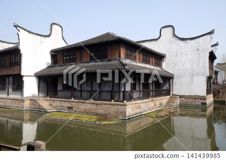 Traditional houses along the Grand Canal, ancient town of Yuehe in Jiaxing, Zhejiang Province, China 141439985