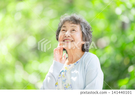 Senior woman, fresh greenery, smile Senior woman, fresh greenery, smile 141440101