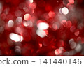 以紅色為底，帶有白色散景效果的聖誕節背景。 141440146
