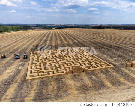 Aerial Hay Bale Maze in Harvested Field Landscape Aerial Hay Bale Maze in Harvested Field Landscape 141440199