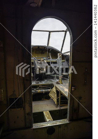 Vintage Aircraft Cockpit Through Arched Door Vintage Aircraft Cockpit Through Arched Door 141440362