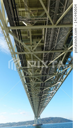 A gigantic suspension bridge viewed from below. A gigantic suspension bridge viewed from below. 141440604