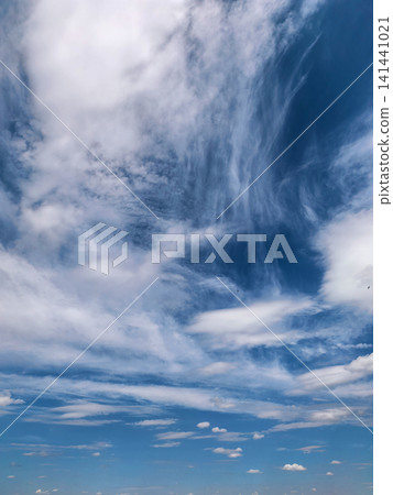 Vertical View of Dramatic Summer Cloudscape Vertical View of Dramatic Summer Cloudscape 141441021