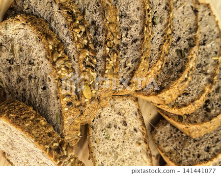 Sliced Homemade Keto Seed Bread Viewed from Above Sliced Homemade Keto Seed Bread Viewed from Above 141441077