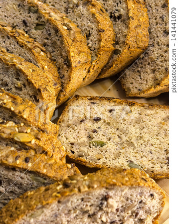 Overhead View of Homemade Keto Seed Bread Slices Overhead View of Homemade Keto Seed Bread Slices 141441079