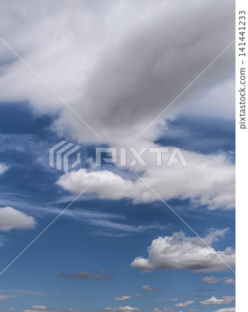Blue Sky with Soft Cumulus and Cirrus Cloud Layers Blue Sky with Soft Cumulus and Cirrus Cloud Layers 141441233