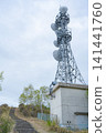 A landscape with a radio tower 141441760