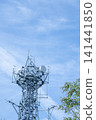 A tower that shines in the blue sky 141441850