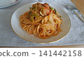 Mushroom and vegetable tomato pasta 141442158