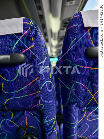 Close-up of the interior of a coach. Travel and transportation concept. Close-up of the interior of a coach. Travel and transportation concept. 141442236