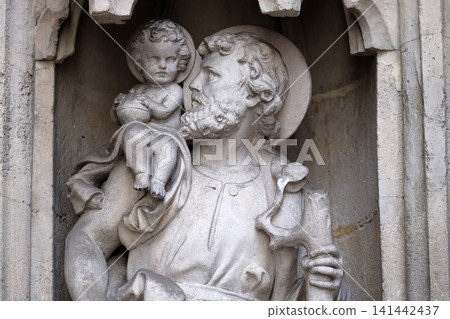 Saint Christopher on the portal of Parish Church of the Holy Blood in Graz, Styria, Austria 141442437