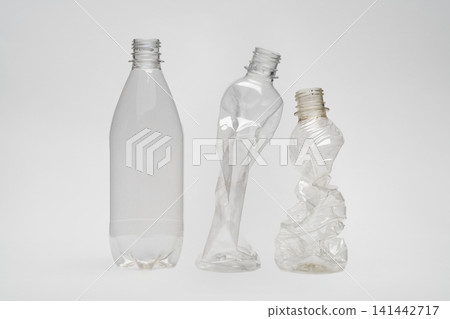 An image depicting heat countermeasures, showing empty plastic bottles lined up after hydration. An image depicting heat countermeasures, showing empty plastic bottles lined up after hydration. 141442717