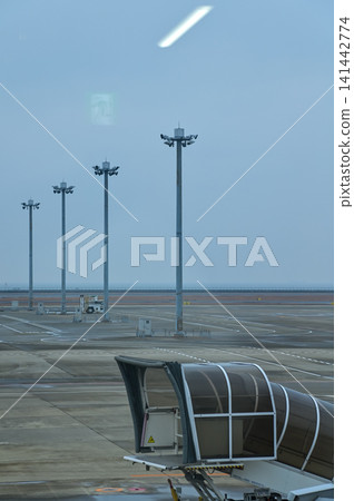 The view of Nagoya Airport during taking off. Airport scene of Nagoya, Japan. Travel concept. The view of Nagoya Airport during taking off. Airport scene of Nagoya, Japan. Travel concept. 141442774